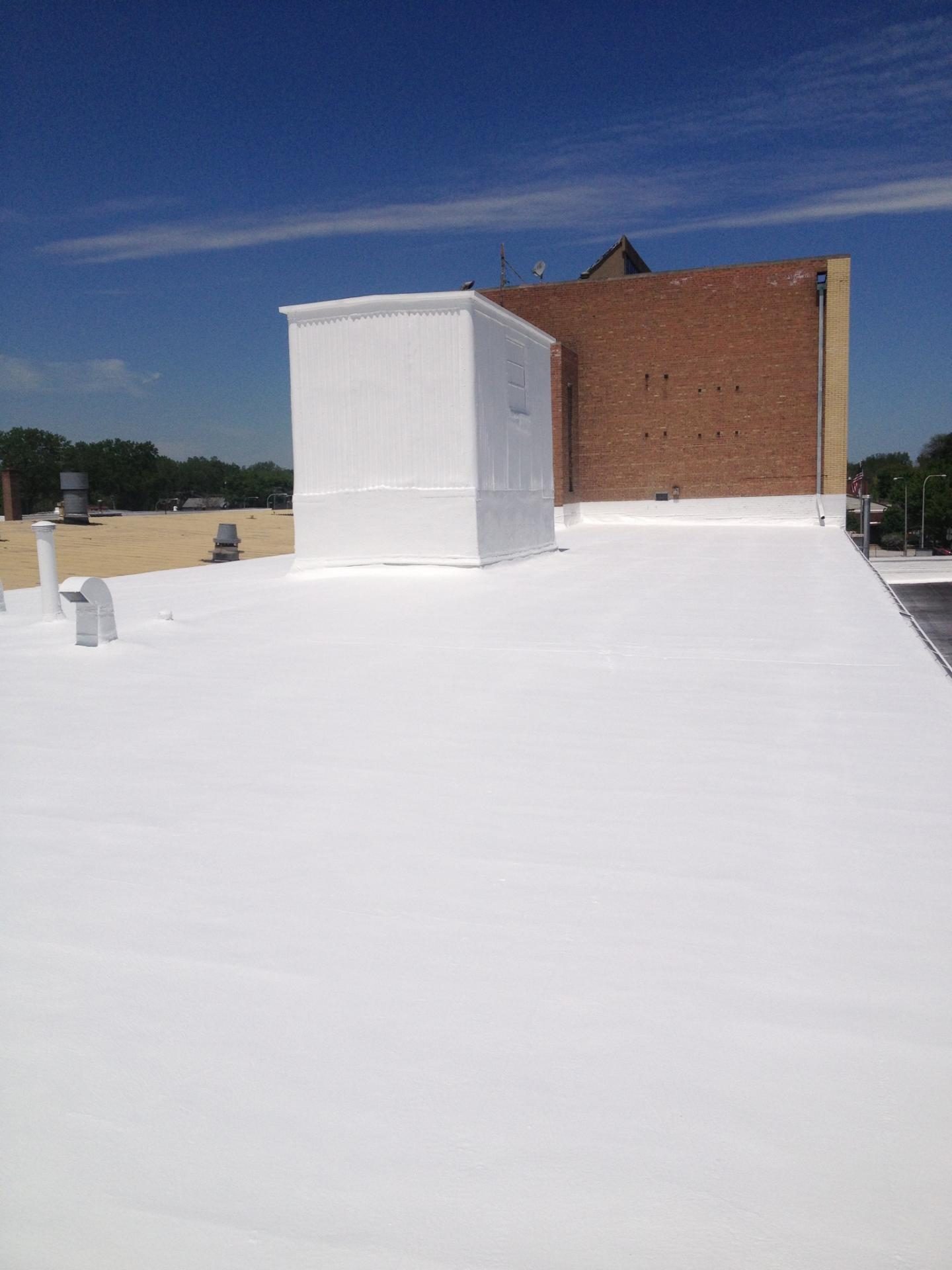 Restored shingle roof with a seamless polyurea membrane
